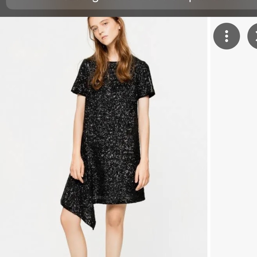 A flattering, chic dress. Darkest navy black.Great with a high platform heel.